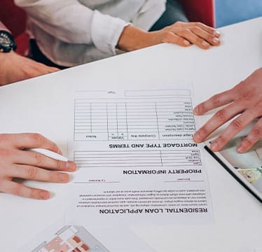 Paperwork on a desk showing financing options