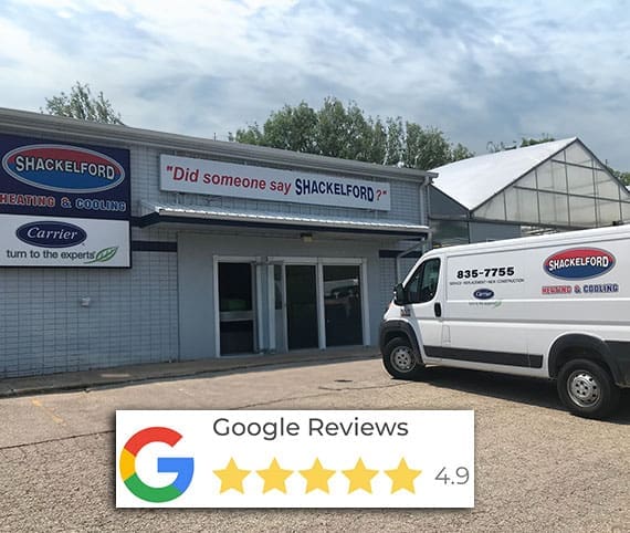 Exterior of Shackelford Heating & Cooling's shop with service van parked in front
