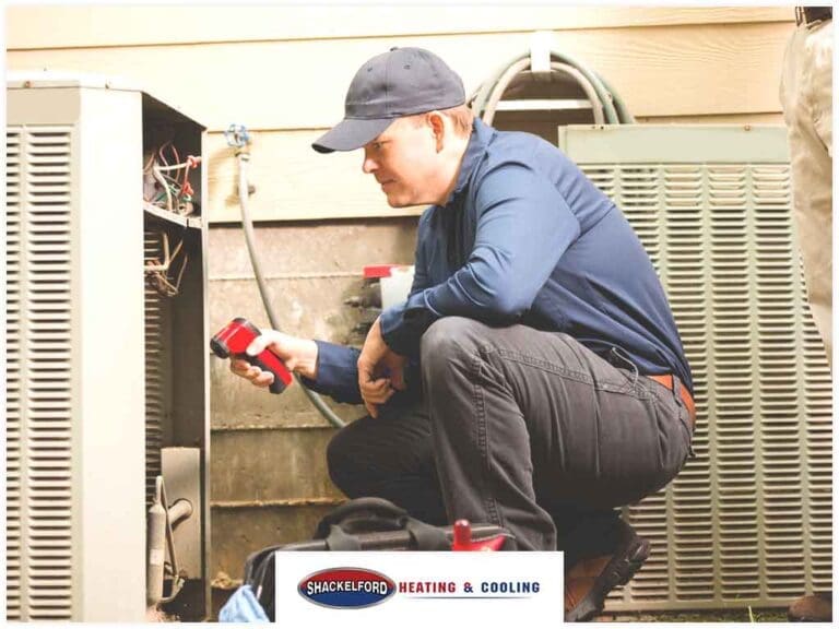 Technician working on an HVAC system