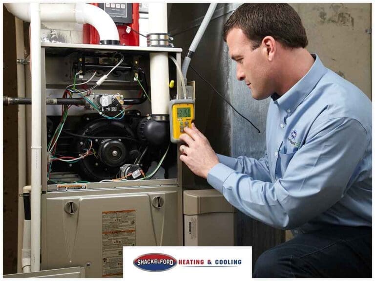 A technician working on an HVAC system
