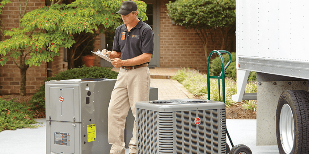 A man bringing new HVAC units