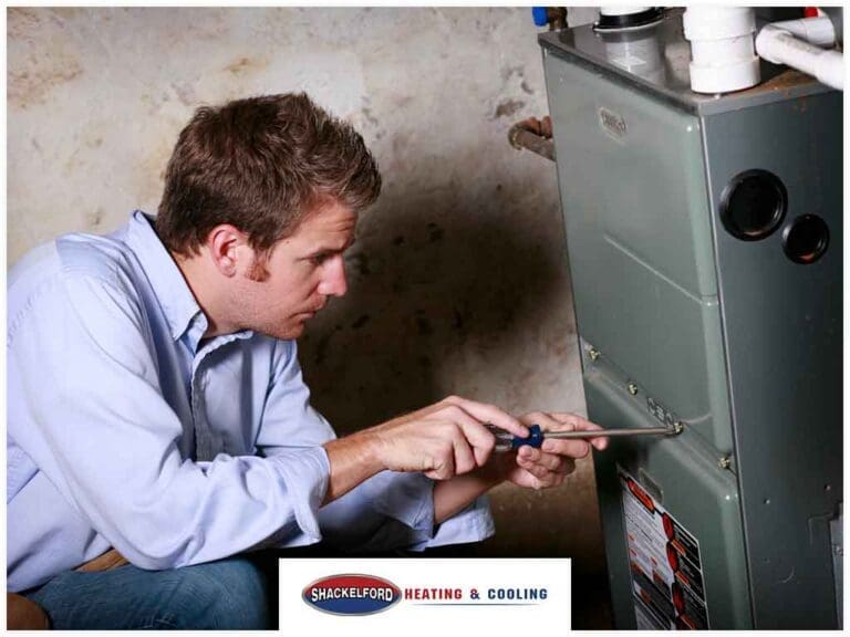 Technician working on an HVAC system