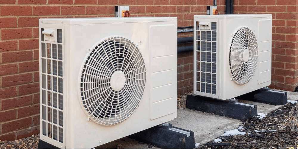 Heat pumps outside of a home.